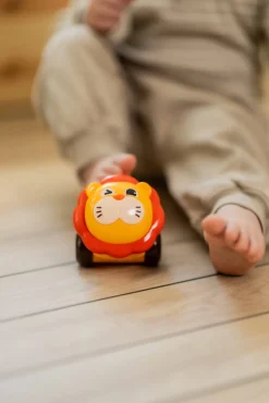 Outlet Baby legetøjsbil - løve med konfetti Legetøjsbiler